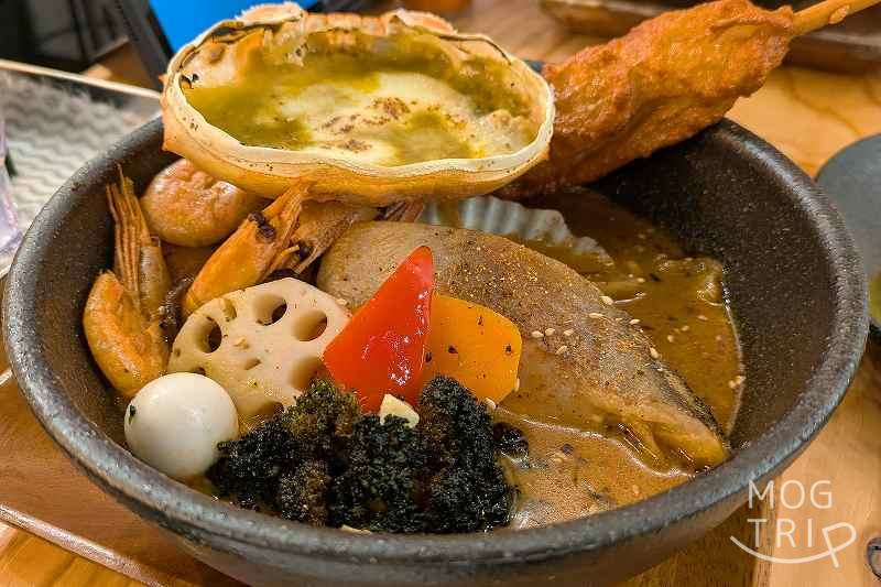 ガラク本店の「カニ甲羅チーズ焼きと大漁 港の恵み」