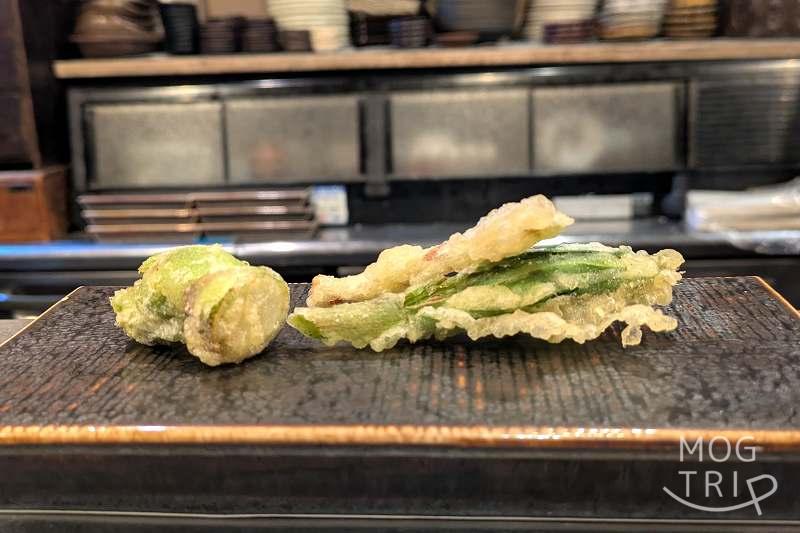 天ぷらと季節の皿吉旦の「タラの芽・行者ニンニク」