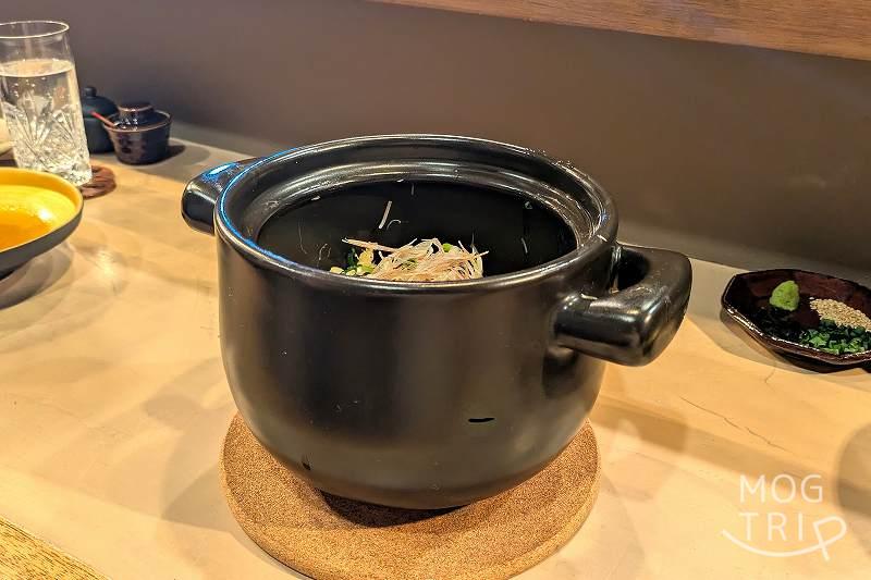 天ぷらと季節の皿吉旦の「焼帆立の土鍋ご飯」